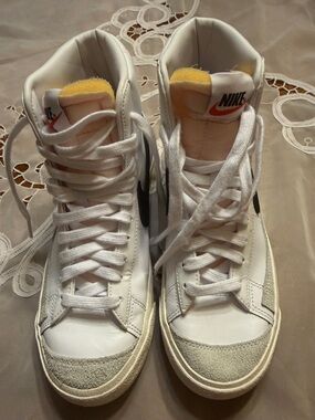 Nike Women’s White and Gray High-Top Sneakers with Red Swoosh